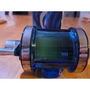 Vintage Avon The Angler Cologne Blue Fishing Reel Bottle FULL bottle.  1618